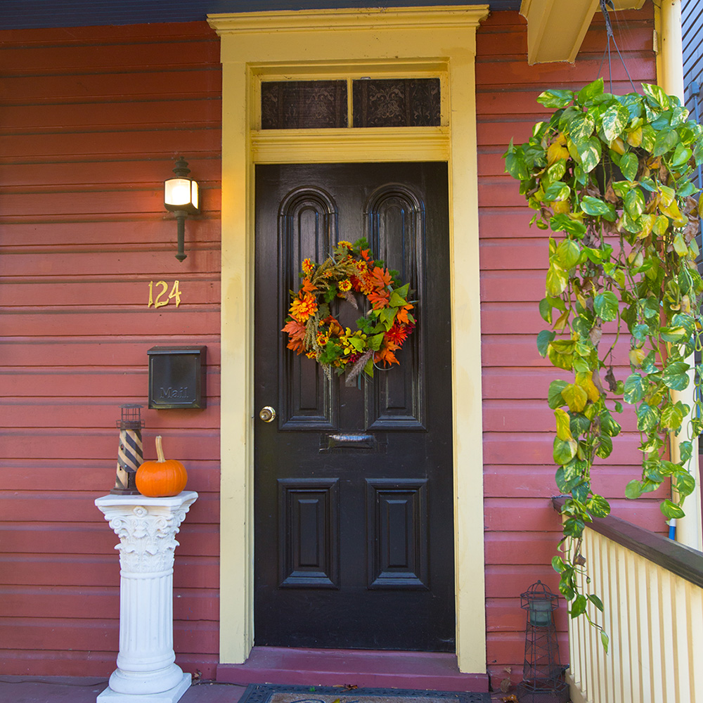 Front door with fall decorations